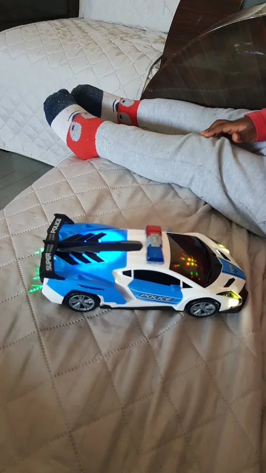 360 Rotating Light Up Police Car Toy photo review