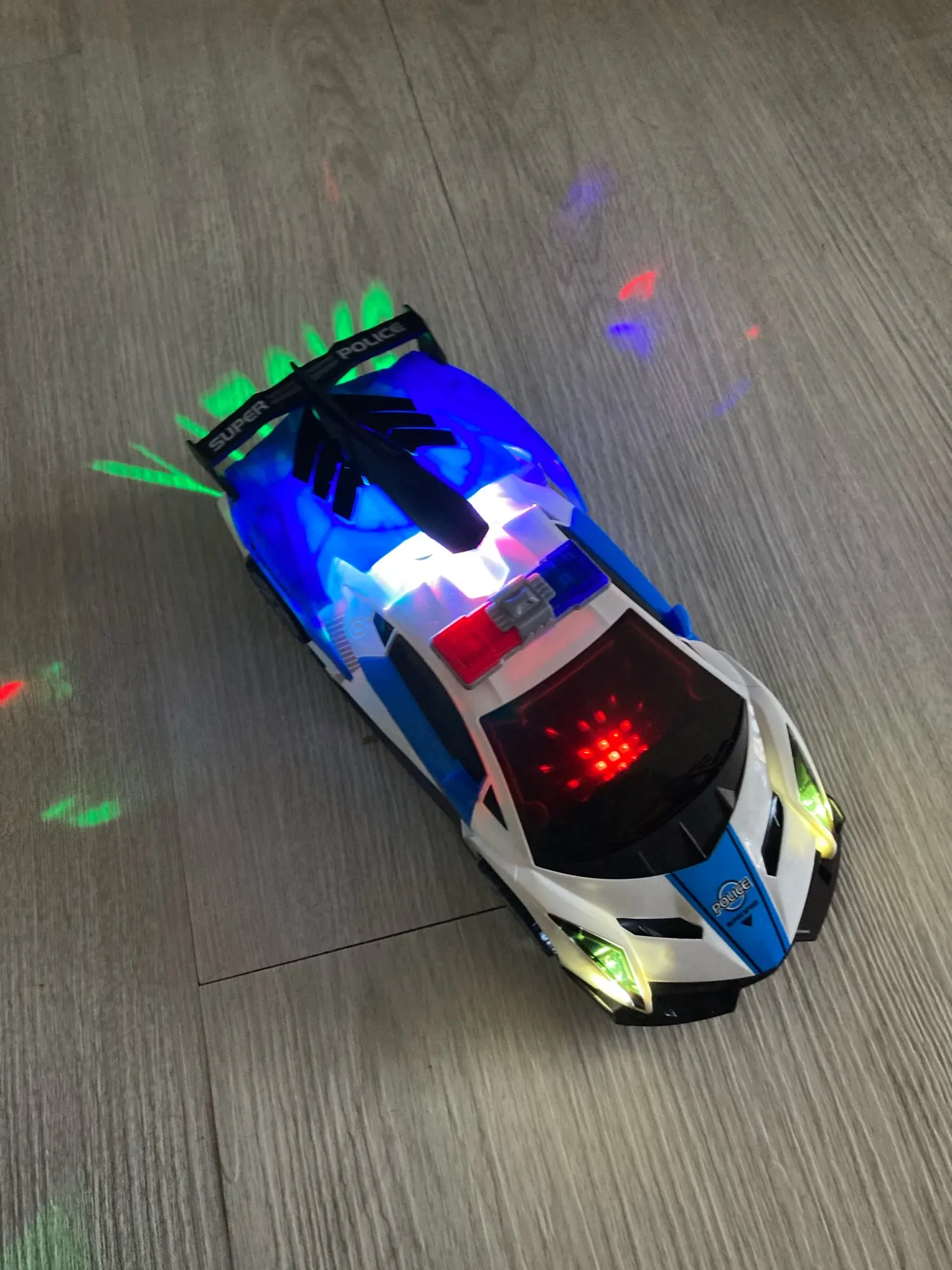 360 Rotating Light Up Police Car Toy photo review