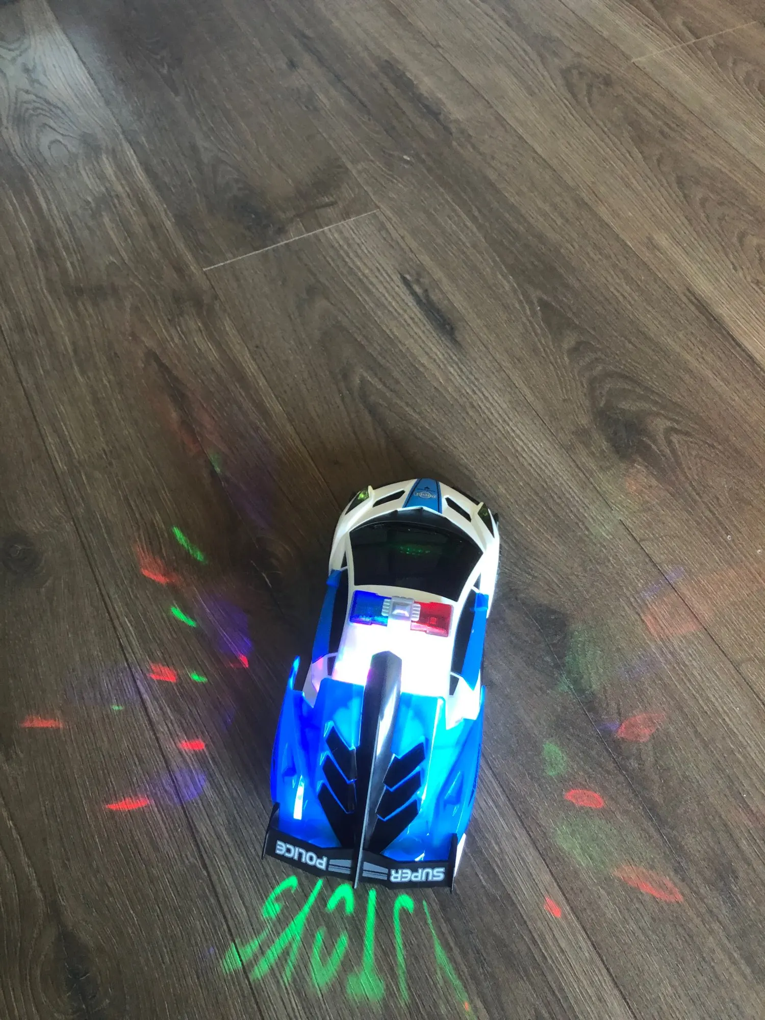 360 Rotating Light Up Police Car Toy photo review