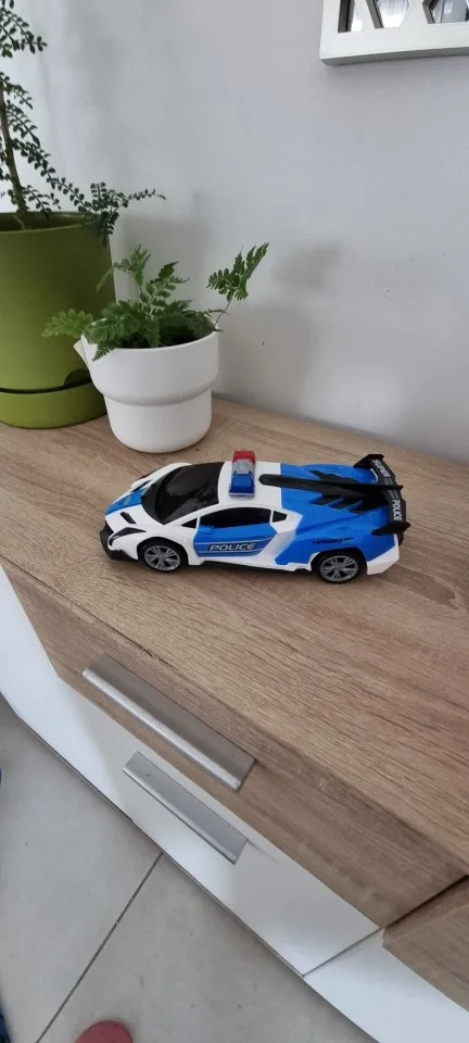 360 Rotating Light Up Police Car Toy photo review