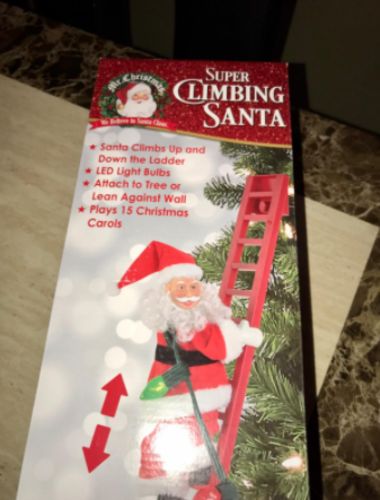 Climbing Santa Klaus photo review