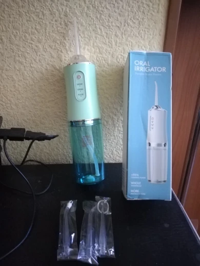 Cordless Water Flosser Teeth Cleaner Portable Oral Irrigator Dental Shower photo review